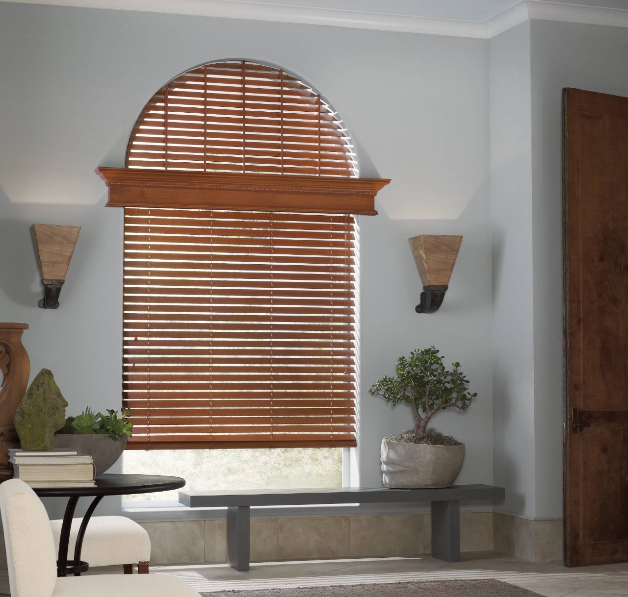 Hunter Douglas arched window blinds adorning a window in a home near Flower Mound, TX